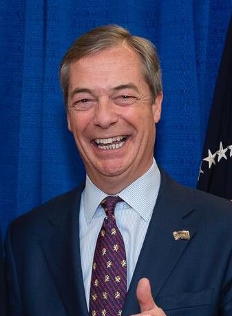 Nigel Farage smiling during a White House visit in March 2019